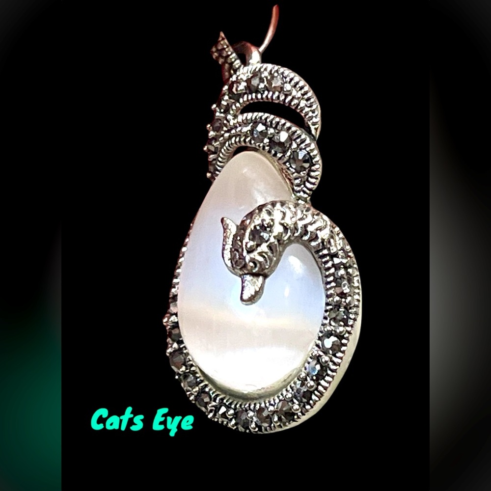 White cats eye pendant with black marcasite-stamped 925